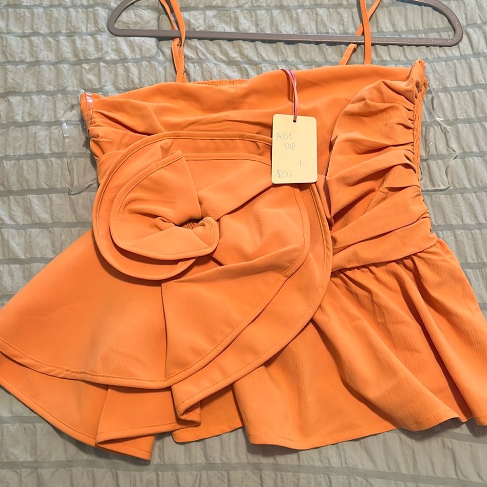 Boutique cute summer top.  Size large NWT